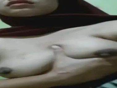 Kaka Jilbab Coklat VC poster